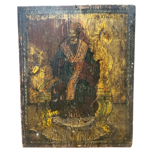 684 - A large Russian orthodox icon panel, polychrome painted, depicting a bearded gentleman wearing a cro... 