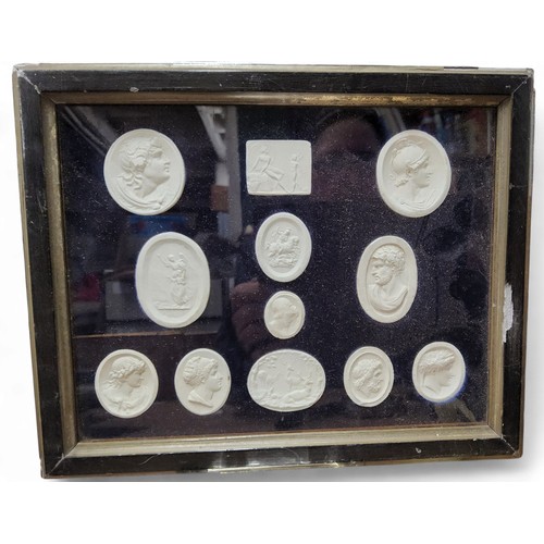 431 - An arrangement of plaster intaglio impressions, various Grand Tour and historical subjects, 17.5cm x... 