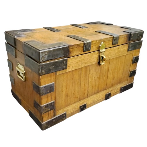 445 - An early 20th century American iron bound silver chest, bold bronze carrying handles and lock plate,... 