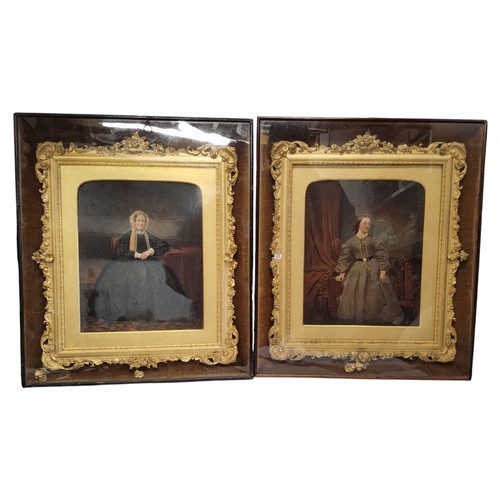 605 - Victorian School, a pair, overpainted portraits of a young and elderly lady, foliate scroll gilt fra... 