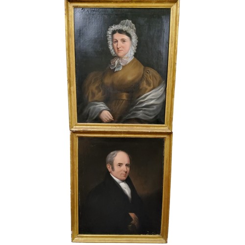 606 - Victorian School, a pair, Portrait of a Gentleman and his Wife, he with a white stock, she with a la... 