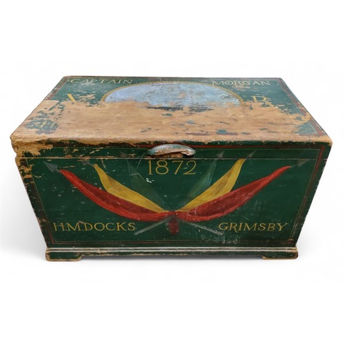 313 - A 19th century pine trunk, painted in green, inscribed Captain Morgan, HM Docks, Grimsby, 1872, 45cm... 