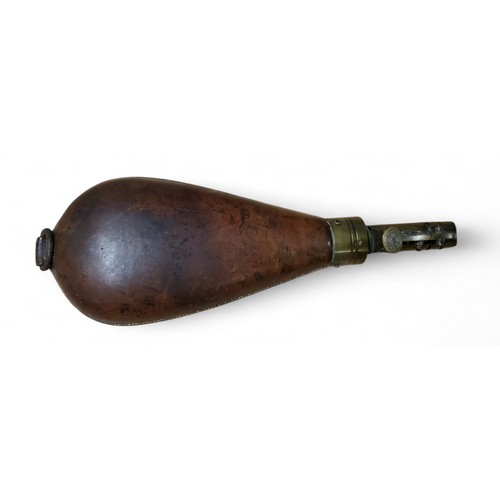 304 - A 19th century leather and brass shot flask, 23cm high, c.1780