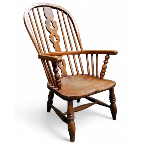 437 - An early 19th century ash and elm Windsor chair, vascular splat, reduced in height, seat height 30cm