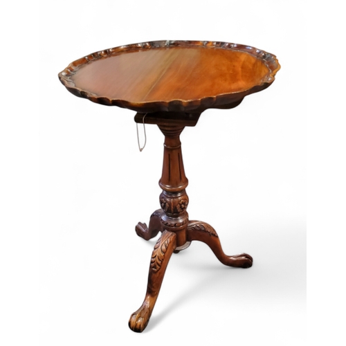 628 - A Chippendale Revival mahogany pie crust occasional table, tilt top, birdcage action, acanthus cappe... 