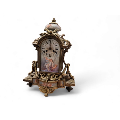 297 - A 19th century French ormolu and porcelain  mantel clock, arched rectangular dial with Roman numeral... 