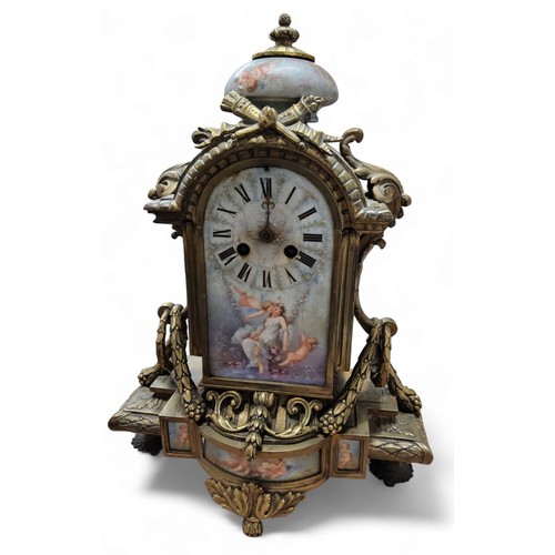 297 - A 19th century French ormolu and porcelain  mantel clock, arched rectangular dial with Roman numeral... 