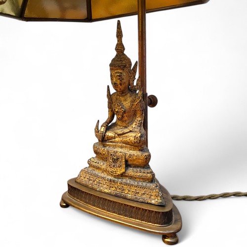 546 - Lighting - a near pair of early 20th century rise and fall library table lamps, each with gilt bronz... 