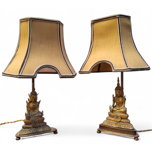 546 - Lighting - a near pair of early 20th century rise and fall library table lamps, each with gilt bronz... 