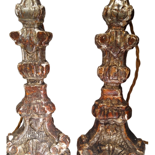 363 - A pair of late 17th century Northern Italian Baroque silvered altar candlesticks, later converted to... 