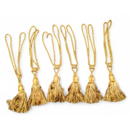 538 - Interior Design - a set of six tasselled curtain tiebacks,  in tones of gold and maroon