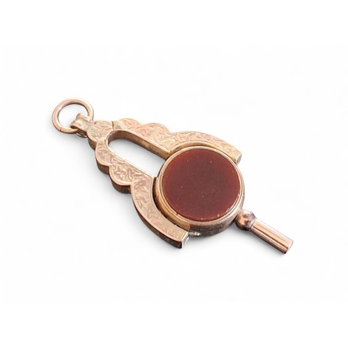 46 - A 9ct rose gold swivel fob/pocket watch key, the key set with a circular bloodstone and Cornelian, t... 