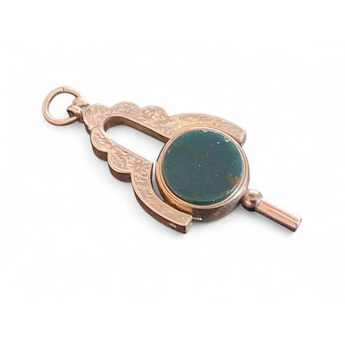 46 - A 9ct rose gold swivel fob/pocket watch key, the key set with a circular bloodstone and Cornelian, t... 