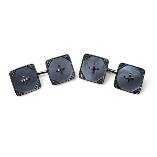 47 - A pair of 9ct white gold and mother of pearl Art Deco cufflinks, in the form of square buttons 5.5g ... 