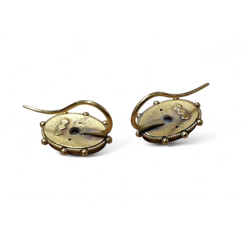 51 - A pair of 15ct gold and diamond chip Etruscan earrings, centrally set with a rough-cut diamond chip,... 