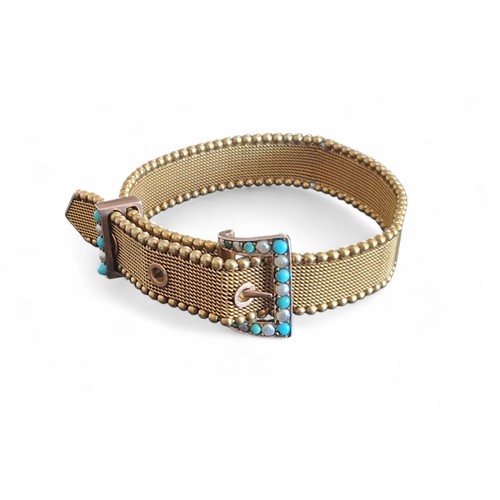 55 - A 9ct gold bracelet in the form of a belt, the mesh bracelet bordered by beads, rose gold buckle and... 