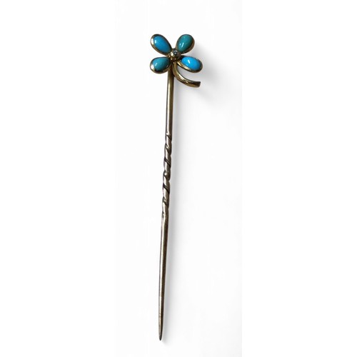 41 - A Victorian gold stick pin, turquoise flower terminal, set with a diamond, 6.5cm long, cased