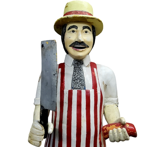 639 - An early 20th century carved wooden lifesize butcher, polychrome painted, approximately 6ft, c.1920