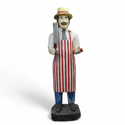 639 - An early 20th century carved wooden lifesize butcher, polychrome painted, approximately 6ft, c.1920