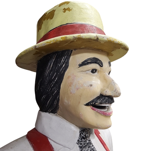 639 - An early 20th century carved wooden lifesize butcher, polychrome painted, approximately 6ft, c.1920