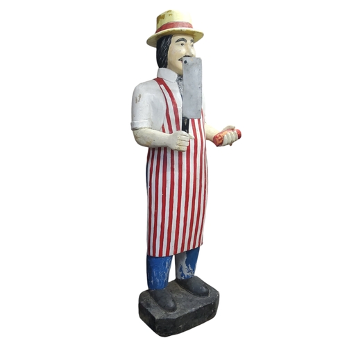 639 - An early 20th century carved wooden lifesize butcher, polychrome painted, approximately 6ft, c.1920