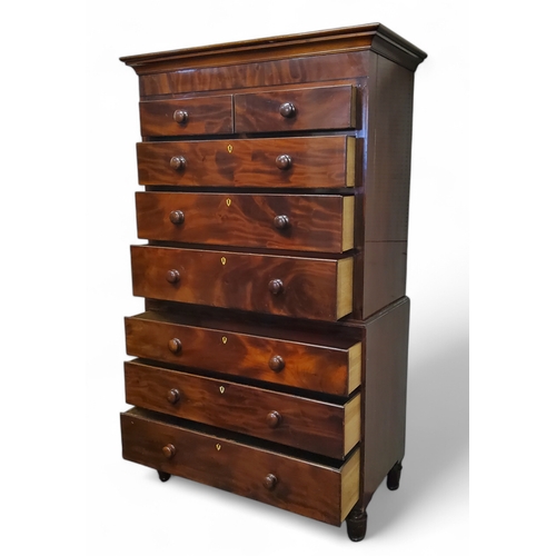 265 - A Regency flamed mahogany chest on chest, oversailing ogee cornice above two short over three gradua... 