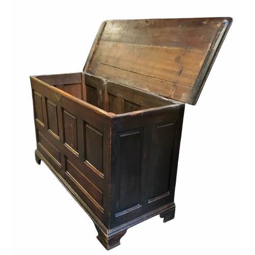 647 - An 18th century oak mule/blanket chest, four fielded panelled front above two faux drawer panels, br... 