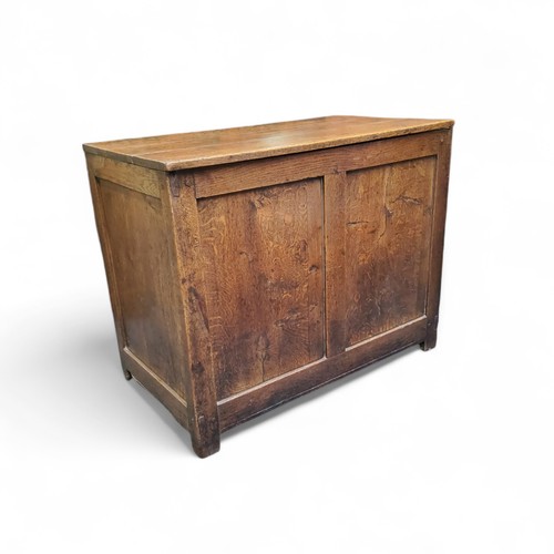 648 - An 18th century oak banket box, two panel front, stile feet, 75cm high, 94.5cm wide, c.1740