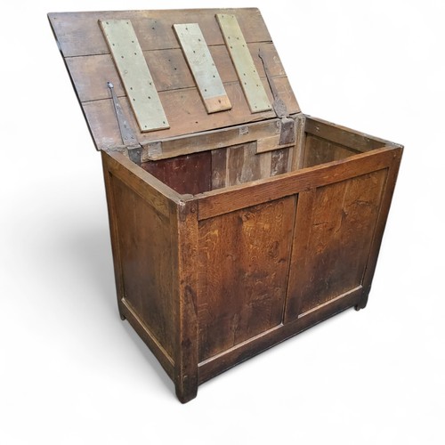 648 - An 18th century oak banket box, two panel front, stile feet, 75cm high, 94.5cm wide, c.1740