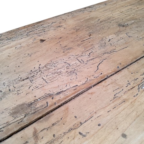 643 - A 19th century French 'Chateau' chestnut farmhouse table, plank top, two long and one short drawer t... 