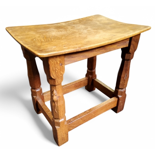 698 - Mouseman of Kilburn - an adzed oak stool, carved with signature mouse, refectory stretcher, 37cm x 4... 