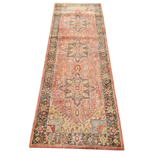 703 - An Oriental Bakhtiari type runner in subtle terracotta colours, 240cm x 77cm