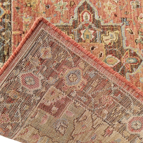 703 - An Oriental Bakhtiari type runner in subtle terracotta colours, 240cm x 77cm