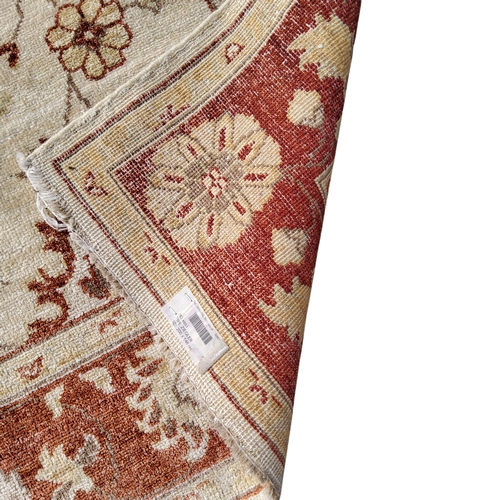 704 - An Afghan Ziegler Faraway rug, cream and red ground, 200cm x 148cm Provenance: originally purch... 