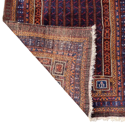 707 - A 19th century Afghan Belutch or Baluch rug, 132cm x 82cm