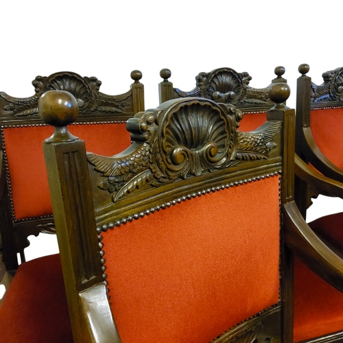 717 - A matching set of twelve boardroom armchairs, anthemion carved backrests, deep red upholstery, H-str... 