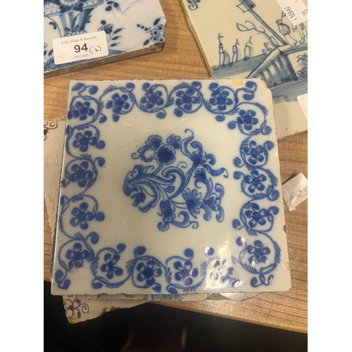 94 - 18th/19th century Dutch Delft tiles, blue and white with landscapes and figures; two others in manga... 