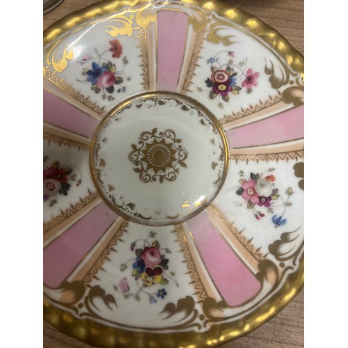 131 - A Chamberlain Worcester coffee cup and saucer, painted with alternating pink and floral panels, c. 1... 