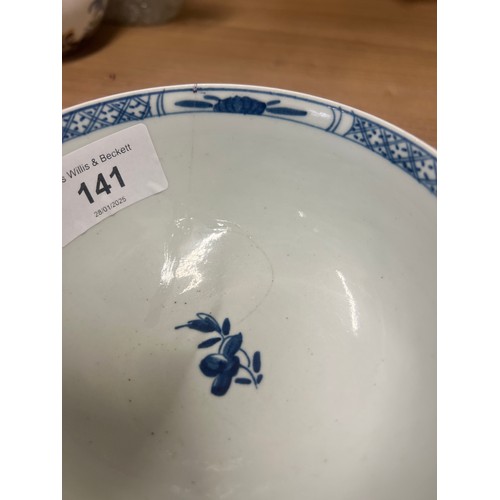 141 - A Worcester Warbler pattern slop bowl,  painted in underglaze blue, the verso with holed rock and zi... 