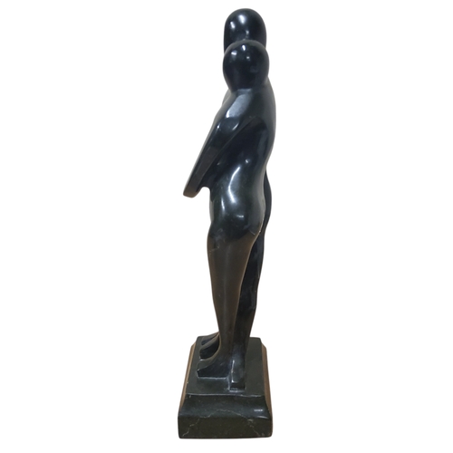 9 - Manner of Henry Moore, carved granite sculpture 'Embrace', 32cm high