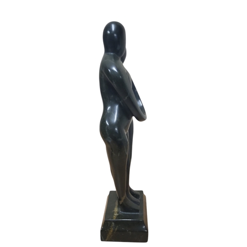 9 - Manner of Henry Moore, carved granite sculpture 'Embrace', 32cm high