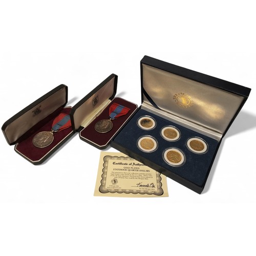 333 - An Elizabeth II Imperial Service Medal, original Royal Mint presentation box;  another; a 'The Morga... 