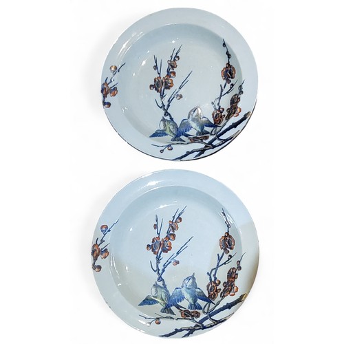 668 - A pair of 19th century Ironstone dished plates, decorated with song birds on blossoming branches, in... 