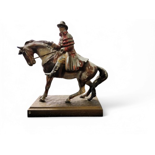 1 - An early cold painted spelter table striker,  in the form of a highwayman on horseback, 22.5cm ... 