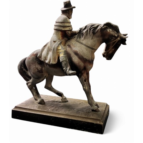 1 - An early cold painted spelter table striker,  in the form of a highwayman on horseback, 22.5cm ... 