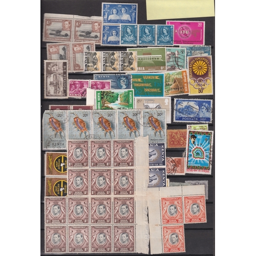 677 - Stamps- A stock book of mint and used GB and Commonwealth stamps, from 1938 onwards, a small folder ... 