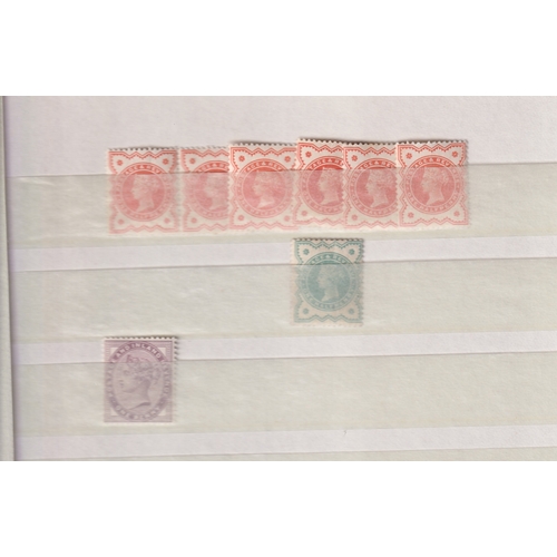 679 - Stamps- a stock book of GB mint and used stamps. Includes perforated line engraved penny red stamps ... 