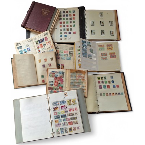 699 - Stamps- A carton containing ten stamp albums/stock books housing a large amount of mint and used Com... 