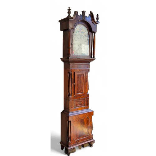 427 - An early 19th century flamed mahogany longcase clock by J. Hutton of Holbeck, the painted arched ena... 