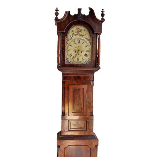 427 - An early 19th century flamed mahogany longcase clock by J. Hutton of Holbeck, the painted arched ena... 